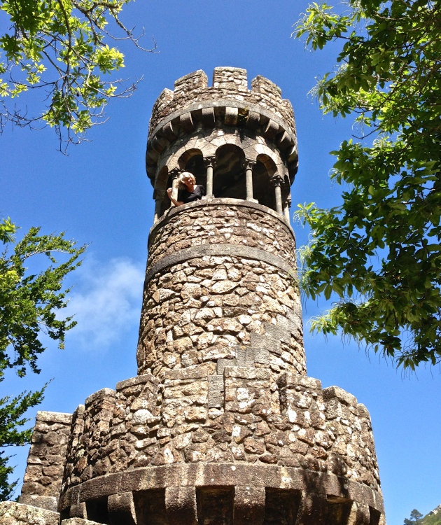 Quinta da Regaleira:  a fantasy tower, with Hilary as an enchanted princess